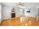 Inviting living room features a fireplace, open to the kitchen, and hardwood flooring at 1002 Defoors Nw Lndg, Atlanta, GA 30318