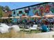 Inviting outdoor patio with umbrellas and ample seating, perfect for relaxing at 1002 Defoors Nw Lndg, Atlanta, GA 30318