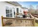 Outdoor deck featuring an outdoor dining table and a gas grill at 2657 Neighborhood S Walk, Villa Rica, GA 30180