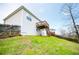 Spacious backyard featuring a wooden deck and fenced yard, perfect for outdoor activities at 2657 Neighborhood S Walk, Villa Rica, GA 30180