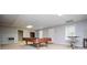 Finished basement with a billiard table and exterior access at 2657 Neighborhood S Walk, Villa Rica, GA 30180