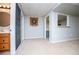 Finished basement including vanity, dart board and open hallway at 2657 Neighborhood S Walk, Villa Rica, GA 30180