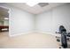 Spacious basement area with neutral carpet and potential for versatile use at 2657 Neighborhood S Walk, Villa Rica, GA 30180