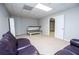 Tanning bed and leather couch located in the basement rec room at 2657 Neighborhood S Walk, Villa Rica, GA 30180