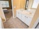 Bathroom featuring double sinks and a large mirror at 2657 Neighborhood S Walk, Villa Rica, GA 30180