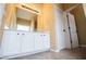 Bathroom featuring cabinet storage, tile floors, and ample lighting at 2657 Neighborhood S Walk, Villa Rica, GA 30180