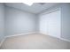 Clean bedroom features neutral walls, plush carpet and a closet, ready for personalization and comfort at 2657 Neighborhood S Walk, Villa Rica, GA 30180
