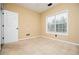Bedroom with carpet flooring, a window, and closet at 2657 Neighborhood S Walk, Villa Rica, GA 30180