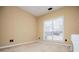 Bedroom with carpet, a window, and great lighting at 2657 Neighborhood S Walk, Villa Rica, GA 30180