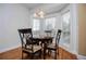 Charming breakfast nook features a round table, window seat, and abundant natural light at 2657 Neighborhood S Walk, Villa Rica, GA 30180