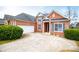 A view of the home's exterior, showcasing the attached garage at 2657 Neighborhood S Walk, Villa Rica, GA 30180
