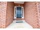 A close-up of the front door, showcasing its classic design and hardware at 2657 Neighborhood S Walk, Villa Rica, GA 30180
