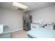 Functional kitchenette equipped with stainless steel refrigerator, white range, and double sink, providing essential amenities at 2657 Neighborhood S Walk, Villa Rica, GA 30180