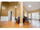 Open concept living room with tall ceilings and expansive hardwood floors at 2657 Neighborhood S Walk, Villa Rica, GA 30180