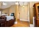 Living room featuring hardwood floors, fireplace and lots of natural light at 2657 Neighborhood S Walk, Villa Rica, GA 30180