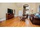 Spacious living room with hardwood floors, high ceilings, and elegant furnishings at 2657 Neighborhood S Walk, Villa Rica, GA 30180