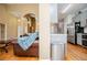 Transitional living room with hardwood floors and open to the kitchen, creating a modern flow at 2657 Neighborhood S Walk, Villa Rica, GA 30180