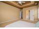 Spacious main bedroom with carpet, a tray ceiling, and an ensuite bathroom at 2657 Neighborhood S Walk, Villa Rica, GA 30180