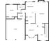 First floor layout showcasing a living room, kitchen, dining room, and garage at 6503 Foggy Oak Dr, Fairburn, GA 30213