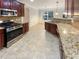 Well-equipped kitchen featuring stainless steel appliances and spacious granite countertops at 6503 Foggy Oak Dr, Fairburn, GA 30213