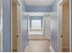 Bathroom view featuring a soaking tub and dual closets at 825 Bufflehead Ct, Stockbridge, GA 30281