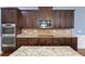 Stylish kitchen with stainless steel appliances and granite counters for a modern appeal at 825 Bufflehead Ct, Stockbridge, GA 30281