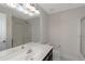 Bathroom featuring a vanity with a white countertop and a glass enclosed shower at 880 Streamside Dr, Mcdonough, GA 30252