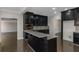 Kitchen featuring granite counters, stainless appliances, and breakfast bar at 880 Streamside Dr, Mcdonough, GA 30252