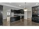 Spacious kitchen with granite countertops, stainless steel appliances, and island at 880 Streamside Dr, Mcdonough, GA 30252