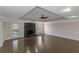 Bright and open living room with hardwood floors, a fireplace, and access to a deck or patio at 880 Streamside Dr, Mcdonough, GA 30252