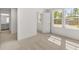 Cozy bedroom with plush carpeting and a view of the front yard at 14 Ramble Way, Sharpsburg, GA 30277