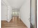 Bright entryway featuring hardwood floors and access to the living spaces at 14 Ramble Way, Sharpsburg, GA 30277