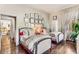 Bright and airy bedroom with twin beds, hardwood floors, and ample natural light at 2 W Muscogee Nw Ave, Atlanta, GA 30305