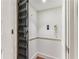 Image of elevator with folding gate, phone, and buttons at 2 W Muscogee Nw Ave, Atlanta, GA 30305