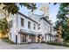 View of the side of the charming multi-story home with beautiful landscaping at 2 W Muscogee Nw Ave, Atlanta, GA 30305