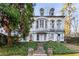 Charming multi-story home with beautiful landscaping and a stone pathway at 2 W Muscogee Nw Ave, Atlanta, GA 30305
