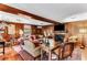 Classic living room with wood paneled walls, hardwood floors, and comfortable seating arrangement at 2 W Muscogee Nw Ave, Atlanta, GA 30305