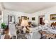 Spacious living room with detailed trim, classic decor, and doorways that lead to other rooms at 2 W Muscogee Nw Ave, Atlanta, GA 30305