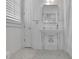 Bright bathroom features an ornate sink and subway tile at 4084 Peachtree Dunwoody Ne Rd, Atlanta, GA 30342