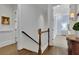 Hallway shows the transition from a staircase to a bedroom at 4084 Peachtree Dunwoody Ne Rd, Atlanta, GA 30342