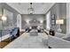 Comfortable living room featuring soft gray walls, elegant furnishings, and sophisticated decor at 4084 Peachtree Dunwoody Ne Rd, Atlanta, GA 30342