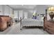 Main bedroom with stylish furniture, rug and decorations and lots of natural light at 4084 Peachtree Dunwoody Ne Rd, Atlanta, GA 30342
