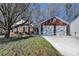 Charming brick home with an attached two-car garage and well-manicured front yard at 500 Allen'S Landing Ct, Lawrenceville, GA 30045