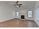 Spacious living room with hardwood floors, fireplace and natural light at 500 Allen'S Landing Ct, Lawrenceville, GA 30045