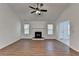Spacious living room with a fireplace, high ceilings, and a view of the back yard at 500 Allen'S Landing Ct, Lawrenceville, GA 30045