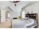 Bedroom featuring a ceiling fan and sloped ceiling at 6641 Poplar Grove Way, Stone Mountain, GA 30087