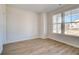 Cozy bonus room with natural light and luxury vinyl plank flooring at 129 Belvedere Rd, Mcdonough, GA 30253