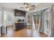 Charming breakfast nook with wood floors, dark cabinets, and sliding glass door access to the deck at 135 Cowan Trl, Stockbridge, GA 30281