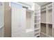 Custom closet with white shelving and drawers to maximize storage space and keep your wardrobe organized at 771 Park Manor Se Dr, Smyrna, GA 30082