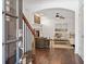 Inviting foyer showcasing hardwood floors, fireplace, and an open view to the living room at 771 Park Manor Se Dr, Smyrna, GA 30082